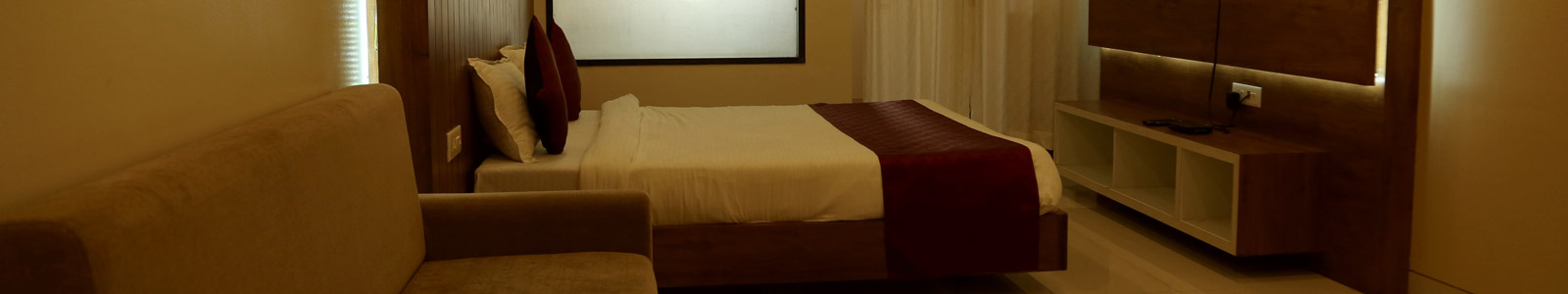 Rooms at New Vaishnavi Hotel